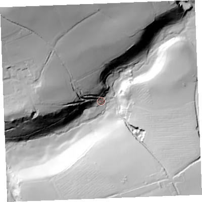 Shaded relief map of the ground around PL276JG, computed from Environment Agency LiDAR. The ground here sits at about 39 m above sea level and falls 74 m across the surrounding 800 m. Surface water reaching this point runs off ground lying to the north-north-west, 61.1 m higher.