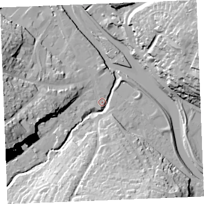 Shaded relief map of the ground around PL277AE, computed from Environment Agency LiDAR. The ground here sits at about 5 m above sea level and falls 38 m across the surrounding 800 m. Surface water reaching this point runs off ground lying to the south, 29.3 m higher.