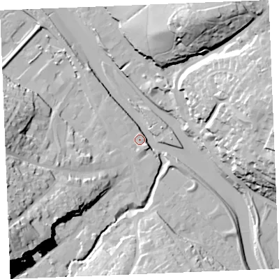Shaded relief map of the ground around PL277AH, computed from Environment Agency LiDAR. The ground here sits at about 5 m above sea level and falls 38 m across the surrounding 800 m. Surface water reaching this point runs off ground lying to the east-north-east, 34.9 m higher.