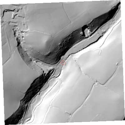 Shaded relief map of the ground around PL277LQ, computed from Environment Agency LiDAR. The ground here sits at about 15 m above sea level and falls 66 m across the surrounding 800 m. Surface water reaching this point runs off ground lying to the south, 56.4 m higher.