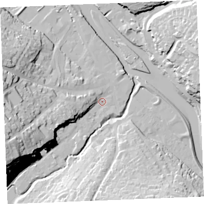 Shaded relief map of the ground around PL277NA, computed from Environment Agency LiDAR. The ground here sits at about 5 m above sea level and falls 46 m across the surrounding 800 m. Surface water reaching this point runs off ground lying to the west-south-west, 22.9 m higher.