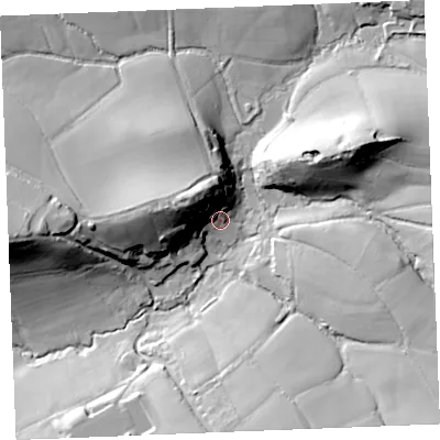 Shaded relief map of the ground around PL303HB, computed from Environment Agency LiDAR. The ground here sits at about 31 m above sea level and falls 34 m across the surrounding 800 m. Surface water reaching this point runs off ground lying to the north-west, 24.5 m higher.