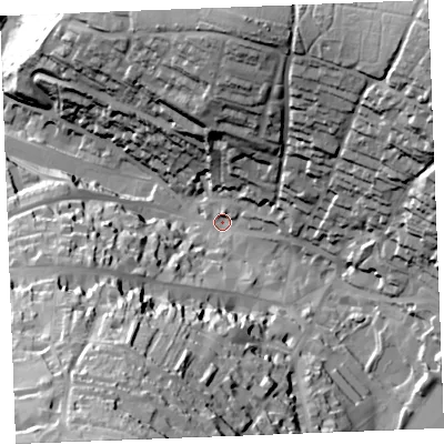 Shaded relief map of the ground around PL312LG, computed from Environment Agency LiDAR. The ground here sits at about 77 m above sea level and falls 75 m across the surrounding 800 m. Surface water reaching this point runs off ground lying to the south-south-west, 63.2 m higher.