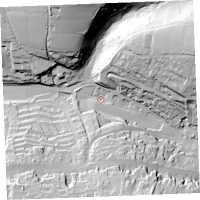 Shaded relief map of the ground around PL312NW, computed from Environment Agency LiDAR. The ground here sits at about 67 m above sea level and falls 62 m across the surrounding 800 m. Surface water reaching this point runs off ground lying to the east-north-east, 55.3 m higher.