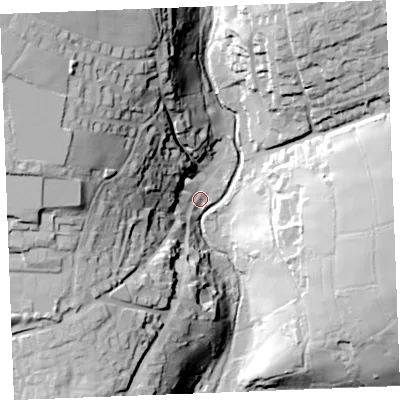 Shaded relief map of the ground around PL329PD, computed from Environment Agency LiDAR. The ground here sits at about 184 m above sea level and falls 61 m across the surrounding 800 m. Surface water reaching this point runs off ground lying to the north-west, 56.9 m higher.