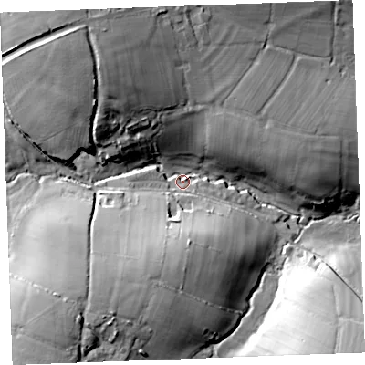 Shaded relief map of the ground around PL329XN, computed from Environment Agency LiDAR. The ground here sits at about 238 m above sea level and falls 37 m across the surrounding 800 m. Surface water reaching this point runs off ground lying to the north-north-west, 30.7 m higher.