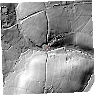 Shaded relief map of the ground around PL329XX, computed from Environment Agency LiDAR. The ground here sits at about 242 m above sea level and falls 35 m across the surrounding 800 m. Surface water reaching this point runs off ground lying to the north-west, 28.6 m higher.