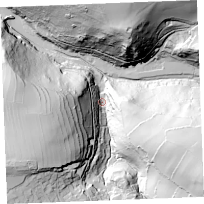 Shaded relief map of the ground around PL350AH, computed from Environment Agency LiDAR. The ground here sits at about 19 m above sea level and falls 124 m across the surrounding 800 m. Surface water reaching this point runs off ground lying to the south-east, 103.4 m higher.
