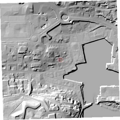 Shaded relief map of the ground around PL40DU, computed from Environment Agency LiDAR. The ground here sits at about 5 m above sea level and falls 38 m across the surrounding 800 m. Surface water reaching this point runs off ground lying to the west-north-west, 10.3 m higher.