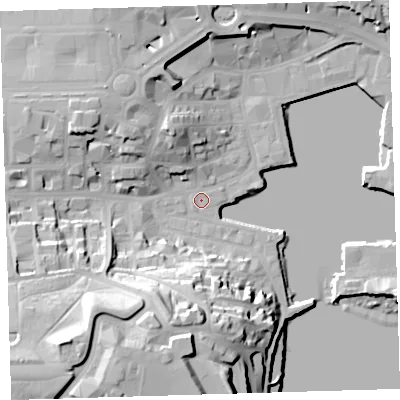 Shaded relief map of the ground around PL40EL, computed from Environment Agency LiDAR. The ground here sits at about 3 m above sea level and falls 38 m across the surrounding 800 m. Surface water reaching this point runs off ground lying to the north-north-west, 11.5 m higher.