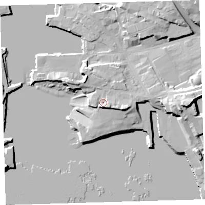 Shaded relief map of the ground around PL40LU, computed from Environment Agency LiDAR. The ground here sits at about 8 m above sea level and falls 21 m across the surrounding 800 m. Surface water reaching this point runs off ground lying to the south-east, 5.6 m higher.