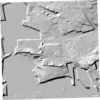 Shaded relief map of the ground around PL40LY, computed from Environment Agency LiDAR. The ground here sits at about 9 m above sea level and falls 22 m across the surrounding 800 m. Surface water reaching this point runs off ground lying to the west, 2.2 m higher.