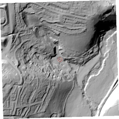 Shaded relief map of the ground around PL68AR, computed from Environment Agency LiDAR. The ground here sits at about 13 m above sea level and falls 87 m across the surrounding 800 m. Surface water reaching this point runs off ground lying to the north-west, 68.8 m higher.