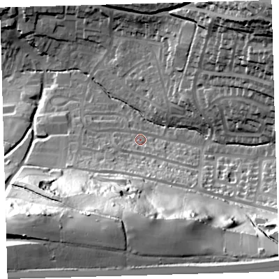 Shaded relief map of the ground around PL71NT, computed from Environment Agency LiDAR. The ground here sits at about 33 m above sea level and falls 71 m across the surrounding 800 m. Surface water reaching this point runs off ground lying to the south-east, 6.9 m higher.