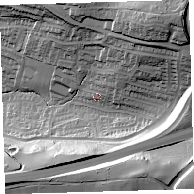 Shaded relief map of the ground around PL71XQ, computed from Environment Agency LiDAR. The ground here sits at about 61 m above sea level and falls 68 m across the surrounding 800 m. Surface water reaching this point runs off ground lying to the north-east, 13.6 m higher.