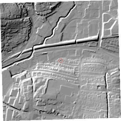 Shaded relief map of the ground around PL72BZ, computed from Environment Agency LiDAR. The ground here sits at about 12 m above sea level and falls 40 m across the surrounding 800 m. Surface water reaching this point runs off ground lying to the south-east, 25.1 m higher.
