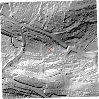 Shaded relief map of the ground around PL72XD, computed from Environment Agency LiDAR. The ground here sits at about 55 m above sea level and falls 69 m across the surrounding 800 m. Surface water reaching this point runs off ground lying to the south-east, 50.6 m higher.