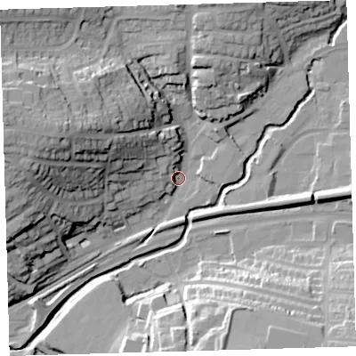 Shaded relief map of the ground around PL74AA, computed from Environment Agency LiDAR. The ground here sits at about 9 m above sea level and falls 38 m across the surrounding 800 m. Surface water reaching this point runs off ground lying to the west-north-west, 35.0 m higher.