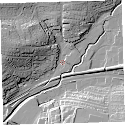 Shaded relief map of the ground around PL74AE, computed from Environment Agency LiDAR. The ground here sits at about 9 m above sea level and falls 36 m across the surrounding 800 m. Surface water reaching this point runs off ground lying to the west-north-west, 33.6 m higher.