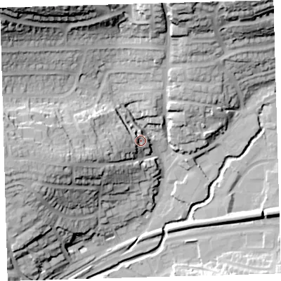 Shaded relief map of the ground around PL74AP, computed from Environment Agency LiDAR. The ground here sits at about 20 m above sea level and falls 56 m across the surrounding 800 m. Surface water reaching this point runs off ground lying to the west, 7.6 m higher.