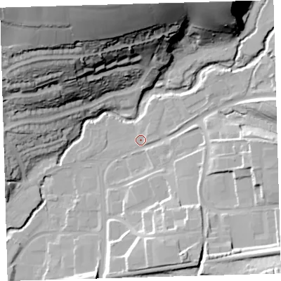 Shaded relief map of the ground around PL74AU, computed from Environment Agency LiDAR. The ground here sits at about 15 m above sea level and falls 64 m across the surrounding 800 m. Surface water reaching this point runs off ground lying to the south-east, 19.1 m higher.