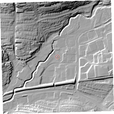 Shaded relief map of the ground around PL74AX, computed from Environment Agency LiDAR. The ground here sits at about 11 m above sea level and falls 37 m across the surrounding 800 m. Surface water reaching this point runs off ground lying to the south-east, 10.1 m higher.