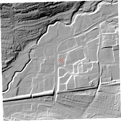 Shaded relief map of the ground around PL74AY, computed from Environment Agency LiDAR. The ground here sits at about 15 m above sea level and falls 41 m across the surrounding 800 m. Surface water reaching this point runs off ground lying to the south-east, 16.3 m higher.
