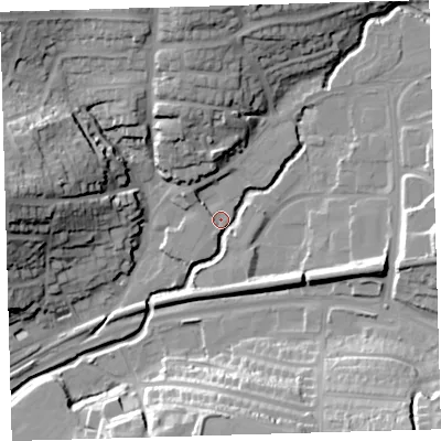 Shaded relief map of the ground around PL74BZ, computed from Environment Agency LiDAR. The ground here sits at about 10 m above sea level and falls 32 m across the surrounding 800 m. Surface water reaching this point runs off ground lying to the north, 23.3 m higher.