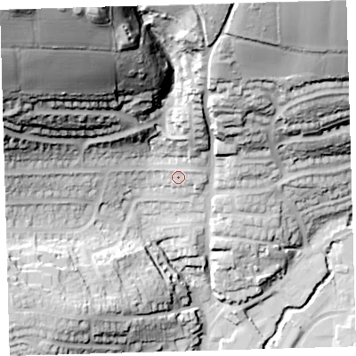 Shaded relief map of the ground around PL74JA, computed from Environment Agency LiDAR. The ground here sits at about 26 m above sea level and falls 96 m across the surrounding 800 m. Surface water reaching this point runs off ground lying to the north-north-east, 17.6 m higher.