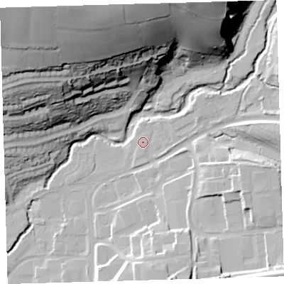 Shaded relief map of the ground around PL74JL, computed from Environment Agency LiDAR. The ground here sits at about 16 m above sea level and falls 72 m across the surrounding 800 m. Surface water reaching this point runs off ground lying to the east-north-east, 1.0 m higher.