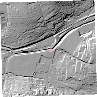 Shaded relief map of the ground around PL74JP, computed from Environment Agency LiDAR. The ground here sits at about 7 m above sea level and falls 34 m across the surrounding 800 m. Surface water reaching this point runs off ground lying to the east, 18.5 m higher.