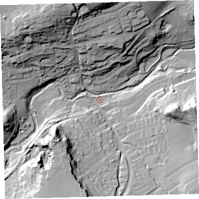 Shaded relief map of the ground around PL82LS, computed from Environment Agency LiDAR. The ground here sits at about 13 m above sea level and falls 58 m across the surrounding 800 m. Surface water reaching this point runs off ground lying to the north, 52.0 m higher.