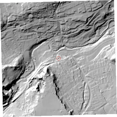 Shaded relief map of the ground around PL82LX, computed from Environment Agency LiDAR. The ground here sits at about 16 m above sea level and falls 56 m across the surrounding 800 m. Surface water reaching this point runs off ground lying to the south-south-west, 33.0 m higher.