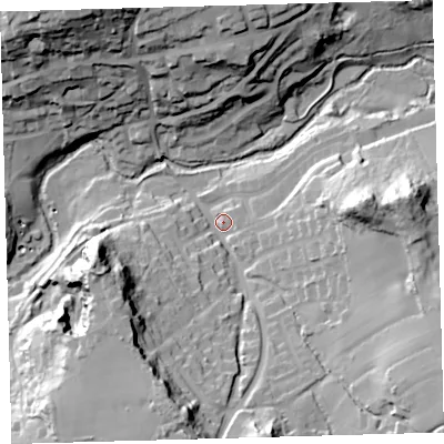 Shaded relief map of the ground around PL82NA, computed from Environment Agency LiDAR. The ground here sits at about 17 m above sea level and falls 50 m across the surrounding 800 m. Surface water reaching this point runs off ground lying to the east, 34.4 m higher.