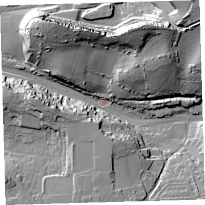 Shaded relief map of the ground around PL97HH, computed from Environment Agency LiDAR. The ground here sits at about 12 m above sea level and falls 49 m across the surrounding 800 m. Surface water reaching this point runs off ground lying to the north-north-east, 44.6 m higher.