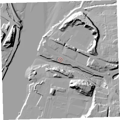 Shaded relief map of the ground around PL97HP, computed from Environment Agency LiDAR. The ground here sits at about 4 m above sea level and falls 33 m across the surrounding 800 m. Surface water reaching this point runs off ground lying to the south-south-east, 28.4 m higher.