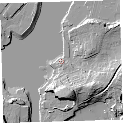 Shaded relief map of the ground around PL97NN, computed from Environment Agency LiDAR. The ground here sits at about 5 m above sea level and falls 38 m across the surrounding 800 m. Surface water reaching this point runs off ground lying to the south-south-east, 3.9 m higher.