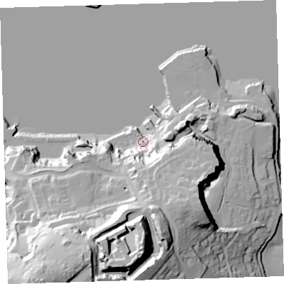 Shaded relief map of the ground around PL99TA, computed from Environment Agency LiDAR. The ground here sits at about 5 m above sea level and falls 57 m across the surrounding 800 m. Surface water reaching this point runs off ground lying to the south-south-east, 35.8 m higher.