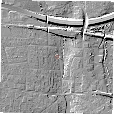Shaded relief map of the ground around PO107DT, computed from Environment Agency LiDAR. The ground here sits at about 5 m above sea level and falls 10 m across the surrounding 800 m. Surface water reaching this point runs off ground lying to the west-north-west, 5.9 m higher.