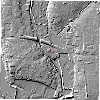 Shaded relief map of the ground around PO107DZ, computed from Environment Agency LiDAR. The ground here sits at about 4 m above sea level and falls 12 m across the surrounding 800 m. Surface water reaching this point runs off ground lying to the west, 3.2 m higher.