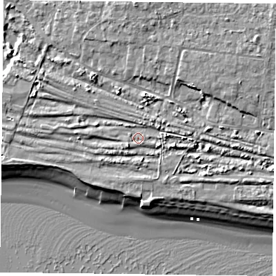 Shaded relief map of the ground around PO110AS, computed from Environment Agency LiDAR. The ground here sits at about 4 m above sea level and falls 10 m across the surrounding 800 m. Surface water reaching this point runs off ground lying to the east, 2.4 m higher.