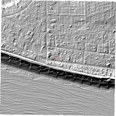 Shaded relief map of the ground around PO119AS, computed from Environment Agency LiDAR. The ground here sits at about 4 m above sea level and falls 9 m across the surrounding 800 m. Surface water reaching this point runs off ground lying to the south, 2.6 m higher.