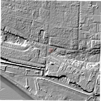 Shaded relief map of the ground around PO122PZ, computed from Environment Agency LiDAR. The ground here sits at about 3 m above sea level and falls 10 m across the surrounding 800 m. Surface water reaching this point runs off ground lying to the north-north-west, 5.8 m higher.