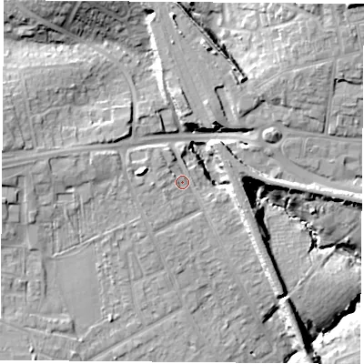 Shaded relief map of the ground around PO141AB, computed from Environment Agency LiDAR. The ground here sits at about 13 m above sea level and falls 21 m across the surrounding 800 m. Surface water reaching this point runs off ground lying to the west, 10.1 m higher.