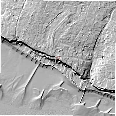 Shaded relief map of the ground around PO143JJ, computed from Environment Agency LiDAR. The ground here sits at about 10 m above sea level and falls 13 m across the surrounding 800 m. Surface water reaching this point runs off ground lying to the west-north-west, 2.7 m higher.