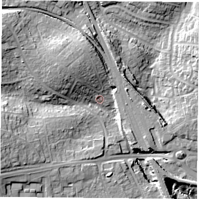 Shaded relief map of the ground around PO155AE, computed from Environment Agency LiDAR. The ground here sits at about 13 m above sea level and falls 23 m across the surrounding 800 m. Surface water reaching this point runs off ground lying to the north-west, 16.1 m higher.