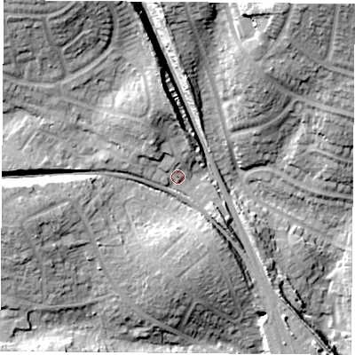 Shaded relief map of the ground around PO156JU, computed from Environment Agency LiDAR. The ground here sits at about 20 m above sea level and falls 28 m across the surrounding 800 m. Surface water reaching this point runs off ground lying to the north, 9.6 m higher.