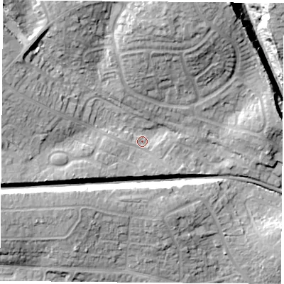 Shaded relief map of the ground around PO156PR, computed from Environment Agency LiDAR. The ground here sits at about 23 m above sea level and falls 21 m across the surrounding 800 m. Surface water reaching this point runs off ground lying to the north-north-east, 16.4 m higher.
