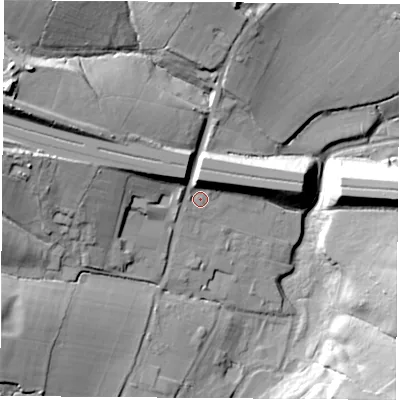 Shaded relief map of the ground around PO156QX, computed from Environment Agency LiDAR. The ground here sits at about 13 m above sea level and falls 33 m across the surrounding 800 m. Surface water reaching this point runs off ground lying to the west-north-west, 24.4 m higher.