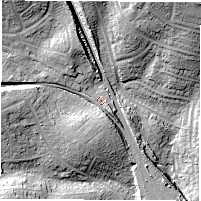 Shaded relief map of the ground around PO156UB, computed from Environment Agency LiDAR. The ground here sits at about 19 m above sea level and falls 25 m across the surrounding 800 m. Surface water reaching this point runs off ground lying to the north-west, 14.5 m higher.